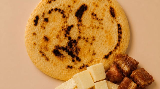 The Pork & Cheese (Queso con Chicharrón).